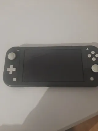 Nintendo Switch Lite Nero/Grigio + Giochi