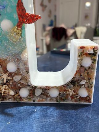 Letra luminosa de decorada a mano