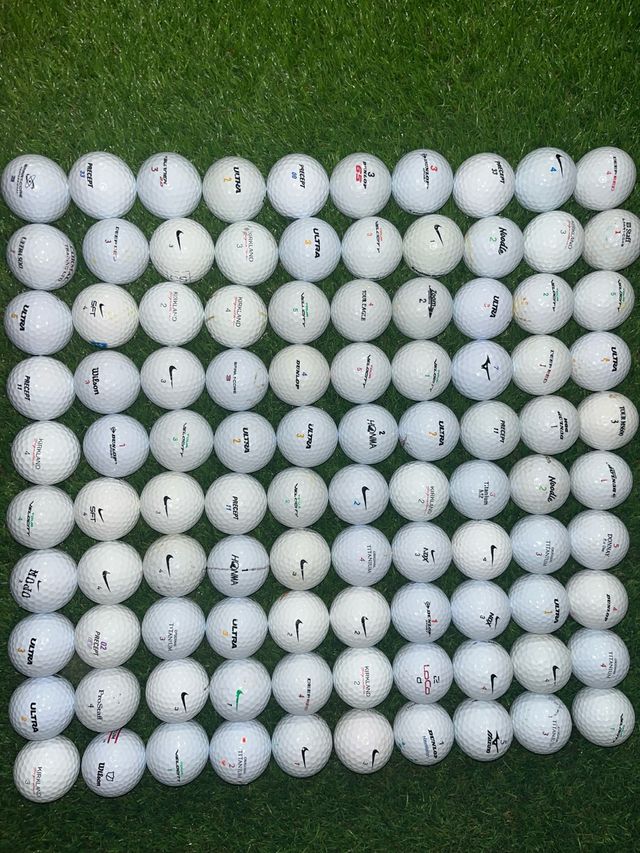 100 bolas de golf variadas