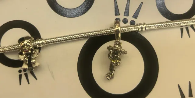 Lote Charms pandora cruela de vill y Jessie