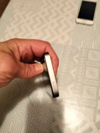 iPhone 5S funciona pero no carga está como nuevo