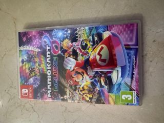 consola Nintendo switch y Mario kart y volantes