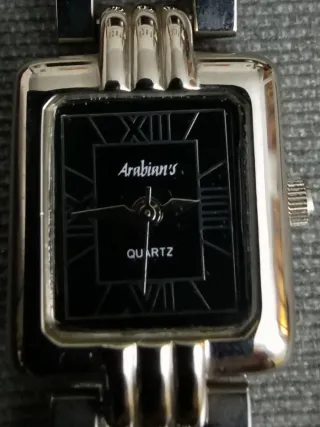 Reloj arabian's quartz stainless steel back.