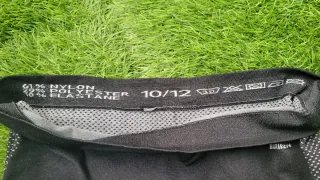 Pantalón térmico niño gris y negro. Talla 10-12.