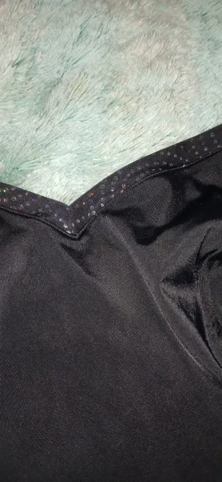 Bañador negro y beige con espalda descubierta