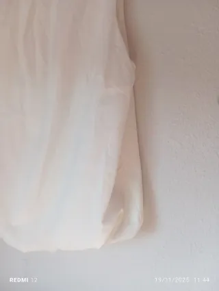 Blusa blanca con pedrería