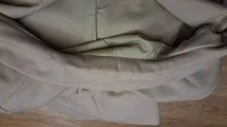 Chaqueta de traje beige. Blazer