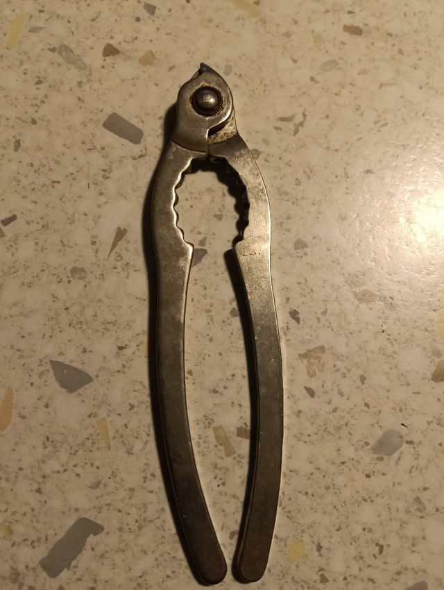 Pinza apribottiglie champagne