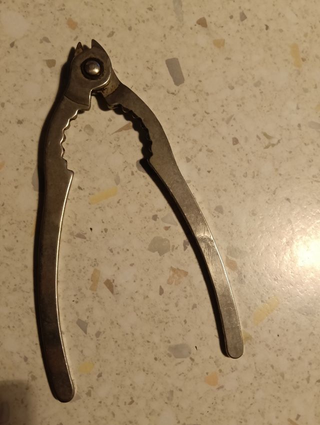 Pinza apribottiglie champagne