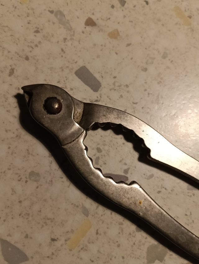 Pinza apribottiglie champagne