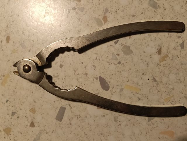 Pinza apribottiglie champagne