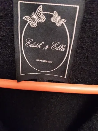 Chaleco negro corto de punto