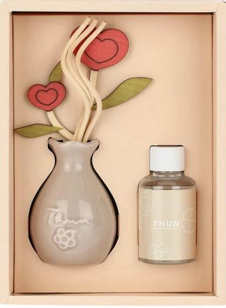 Diffusore Thun con fiori e bacchette