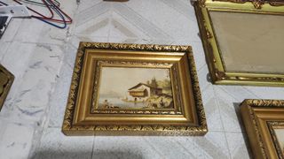 Marcos de madera y cristal dorados