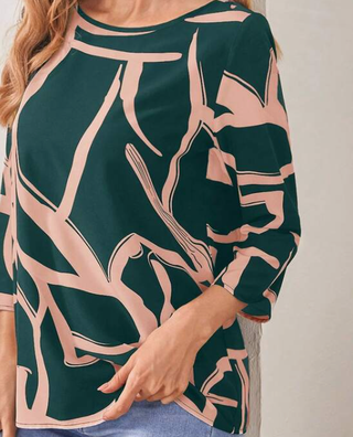 Blusa estampada verde y rosa