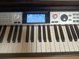 Piano eléctrico con mueble