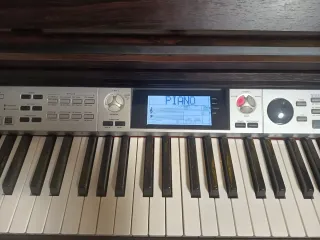 Piano eléctrico con mueble