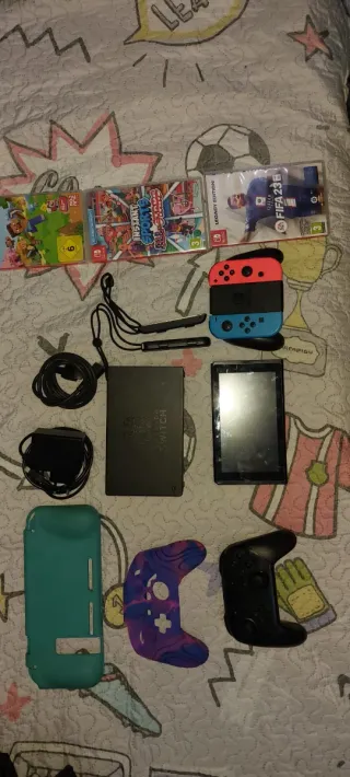 Nintendo Switch + Juegos y Accesorios