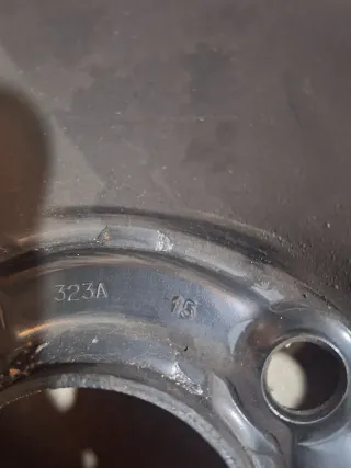 Tapacubos y llanta chapa Peugeot 206