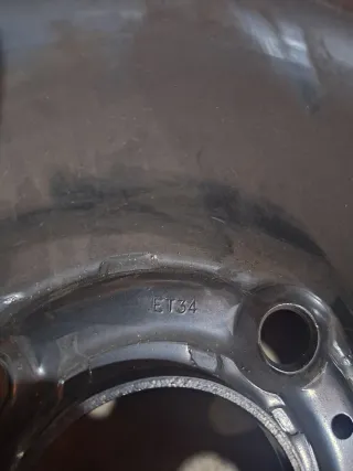 Tapacubos y llanta chapa Peugeot 206