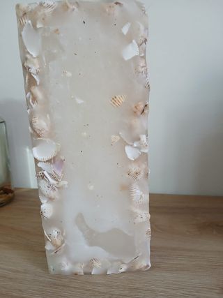 Candela decorativa con conchiglie