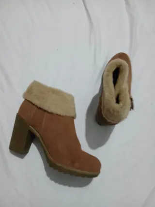 Stivaletti con tacco e pelliccia