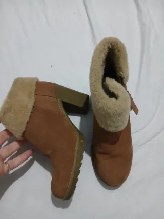 Stivaletti con tacco e pelliccia