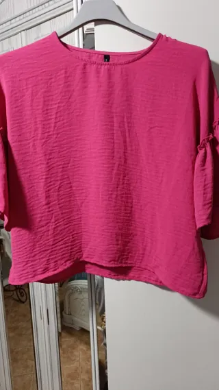 Blusa rosa mangas cortas