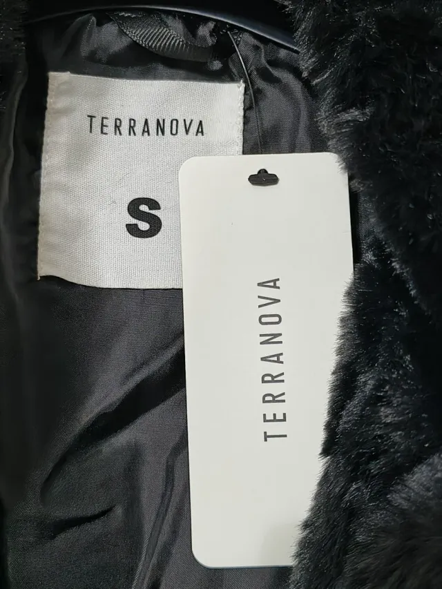 Cappotto in similpelliccia collo con revers