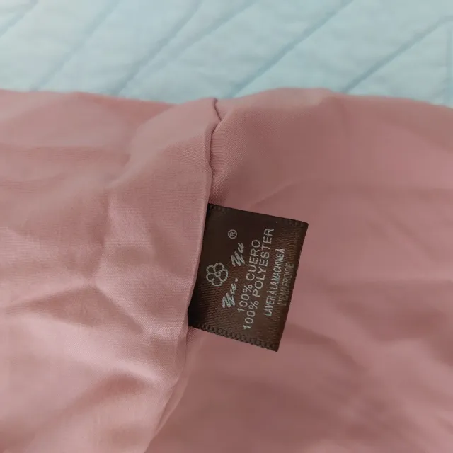 Bolero cubre hombros rosa plumeti..