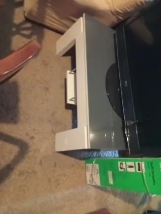 Mesa de comedor de cristal y 4 sillas