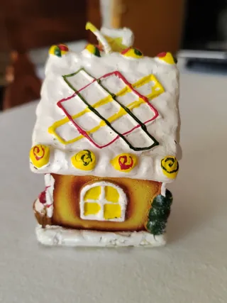 Candela natalizia casa pan di zenzero