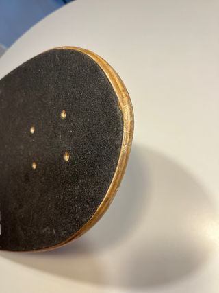 Tabla surfskate on shore skeleton bay