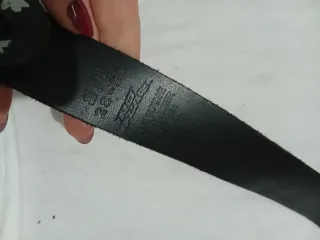 Cintura nera con figure stilizzate argento