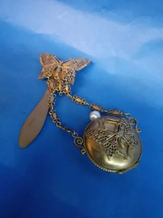 Porta fotos antiguo mariposa y perla