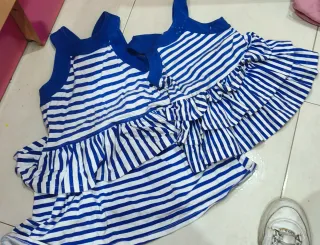 Vestidos iguales 18 meses y 7 años