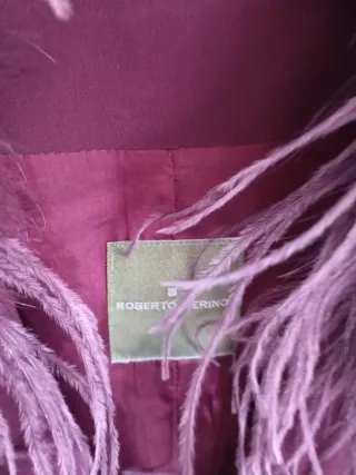 Americana morada con plumas