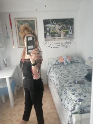 Conjunto pantalón y jersey negro