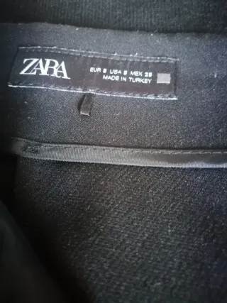 Conjunto pantalón y jersey negro