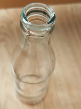 Vecchie bottiglie di Kas e San Miguel