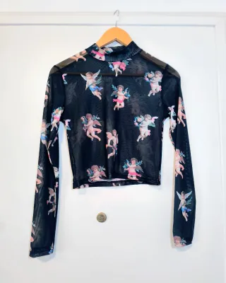 Crop top malla con estampado de ángeles L