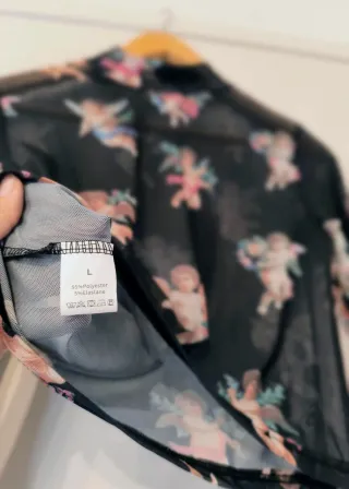 Crop top malla con estampado de ángeles L