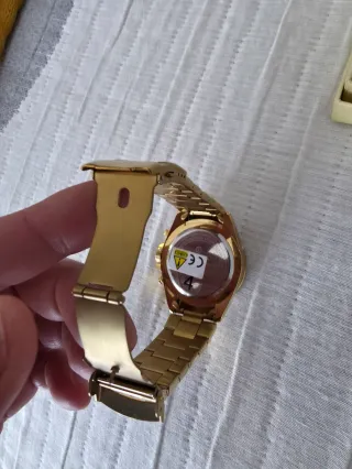 Reloj Biden Dorado