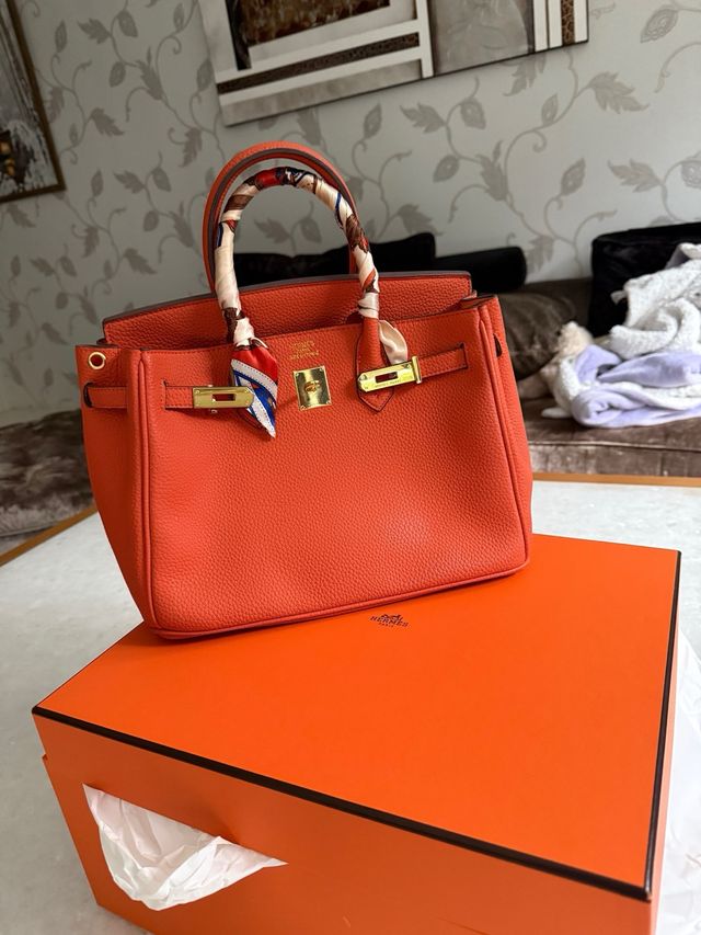 Bolso Hermès Naranja con Accesorios