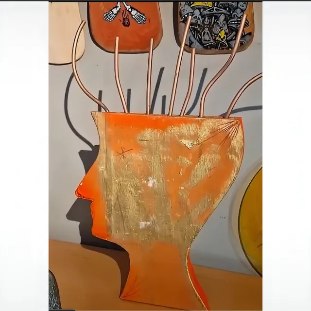 Scultura in legno e rame, realizzata da Atelier