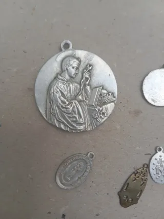 Lote 7 medallas religiosas