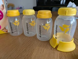 Sacaleches Medela Solo con 4 botes y tetina Calma