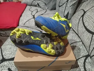Botas de fútbol Joma niño azul y amarillo