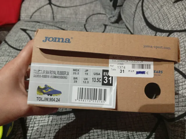 Botas de fútbol Joma niño azul y amarillo