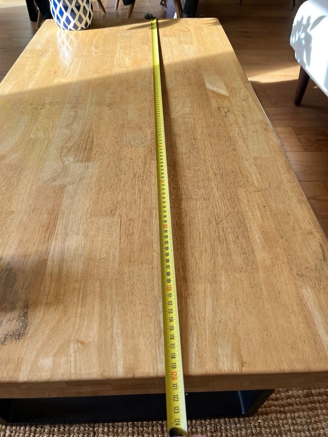 Tavolo da centro in legno con gambe in acciaio laccato nero